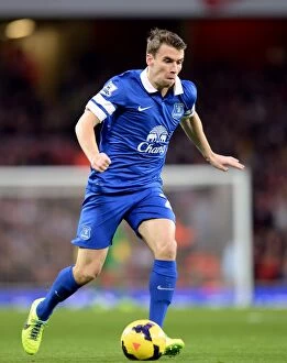 Images Dated 8th December 2013: A Draw at Emirates: Seamus Coleman's Everton Holds Firm Against Arsenal (December 8, 2013)