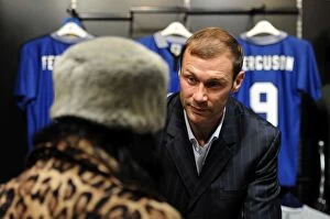Images Dated 7th December 2011: Duncan Ferguson signs copies of Evertons Greatest Premier League XI DVD in the Everton Two Store