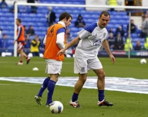 Images Dated 31st March 2012: Everton FC: Baines and Gibson Preparing for Action against West Bromwich Albion (March 31, 2012)