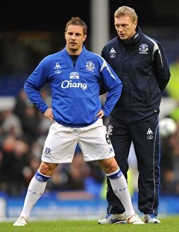 Images Dated 20th March 2010: Everton FC: Moyes and Jagielka Strategize during Warm-Up at Goodison Park