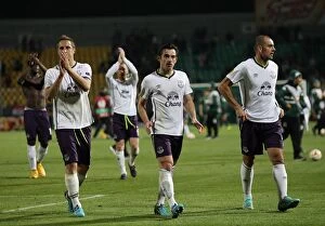 Images Dated 2nd October 2014: Everton Players Show Appreciation: Jagielka, Baines, and Gibson Applaud Everton Fans after UEFA