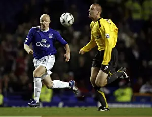 Andy Johnson Prints: Everton v Arsenal Carling Cup Fourth Round Andrew Johnson and Arsenals Philippe Senderos