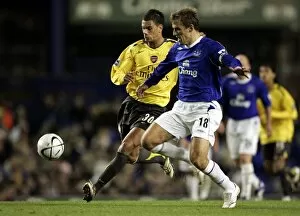 Everton v Arsenal (November) Collection: Everton v Arsenal Carling Cup Fourth Round Phil Neville and Jeremie Aliadiere in