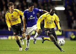 Everton v Arsenal (November) Collection: Everton v Arsenal Carling Cup Fourth Round Tim Cahill is challenged by Mark Randall