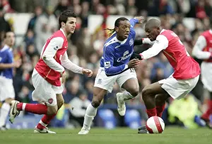 Everton v Arsenal Manuel Fernandes in action with Francesc Fabregas and Vasiriki Abou Diaby