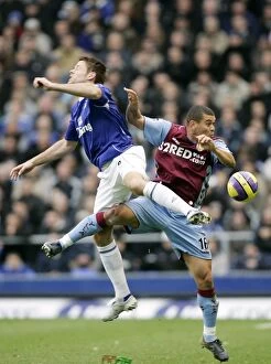 James Beattie Gallery: Everton v Aston Villa Evertons James Beattie in action against Aston Villas Wilfred Bouma