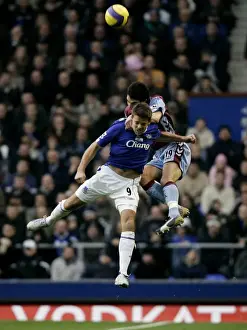 James Beattie Prints: Everton v Aston Villa Evertons James Beattie in action against Aston Villas Liam Ridgewell