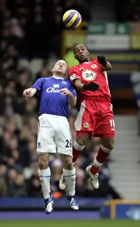 Everton v Blackburn Rovers Benni McCarthy and Lee Carsley in action