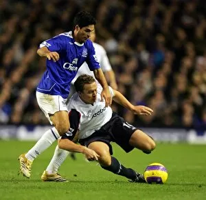 Everton v Bolton Collection: Everton v Bolton - Evertons Mikel Arteta and Boltons Kevin Davies in action