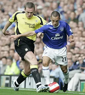 Everton V Manchester City Prints: Everton v Manchester City - Evertons Leon Osman battles with Manchester Citys Richard Dunne