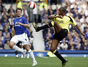 James Beattie Prints: Everton v Manchester City James Beattie of Everton in action against Sylvain Distin of Manchester City