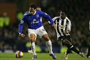 Images Dated 30th December 2006: Everton v Newcastle United Joleon Lescott and Obafemi Martins in action