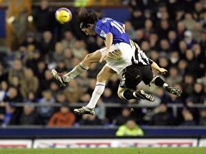 Images Dated 30th December 2006: Everton v Newcastle United Nuno Valente wins a header from Newcastles James Milner