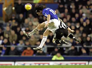 Everton v Newcastle United Nuno Valente wins a header from Newcastles James Milner