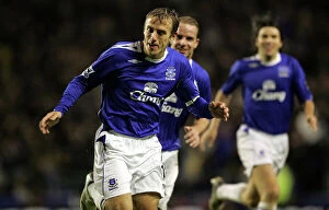 Everton v Newcastle United Collection: Everton v Newcastle United Phil Neville celebrates after scoring his teams third goal of the game
