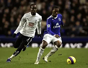 Everton V Tottenham Hotspur Prints: Everton v Tottenham Hotspur Manuel Fernandes in action against Pascal Chimbonda