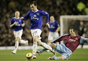 James McFadden Gallery: Everton v West Ham - Evertons James McFadden is fouled by West Hams Lee Bowyer