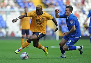 30 July 2011 Birmingham City V Everton Prints: Everton vs Birmingham City: A Football Rivalry - Louis Saha vs Jordan Mutch's Intense Battle for Control