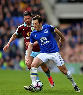 Everton V Burnley - Goodison Park Prints: Everton vs Burnley: Intense Battle for the Ball - Leighton Baines vs George Boyd (Premier League 2016-17)