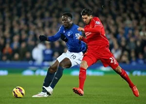 Images Dated 7th February 2015: Everton vs Liverpool: Lukaku vs Can - The Intense Rivalry at Goodison Park