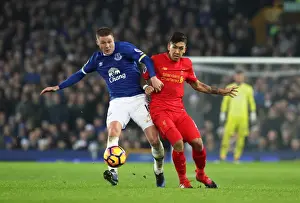 Soccer Football Prints: Everton vs Liverpool: McCarthy vs Firmino - Intense Battle for Ball at Goodison Park