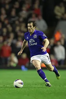 13 March 2012 V Liverpool, Anfield Prints: Everton vs. Liverpool Rivalry: Leighton Baines Intense Battle at Anfield (13 March 2012)