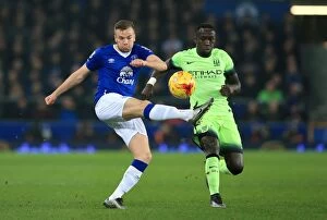 Capital One Cup - Everton v Manchester City - Semi Final - First Leg - Goodison Park Collection: Everton vs Manchester City: A Fight for Possession in the Capital One Cup Semi-Final at Goodison