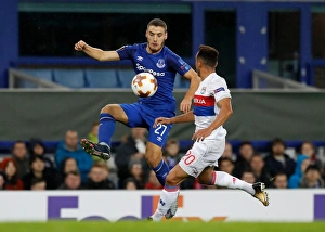 Everton vs. Olympique Lyonnais - Group E Clash: A Battle for the Ball (Nikola Vlasic vs. Marcal)