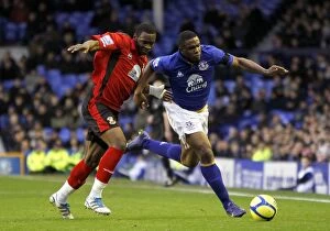 Images Dated 7th January 2012: Everton vs Tamworth: A FA Cup Battle - Anichebe vs Kanyuka's Intense Rivalry for Ball Possession