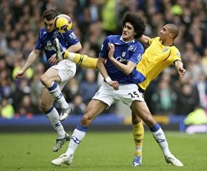 Images Dated 28th February 2009: Everton vs. West Bromwich Albion: Baines and Fellaini Go Head-to-Head in Intense Barclays Premier