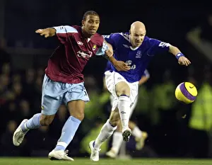 Framed Print : Everton vs. West Ham: A Rivalry Ignited - Johnson vs. Ferdinand Framed Print : Everton vs. West Ham: A Rivalry Ignited - Johnson vs. Ferdinand