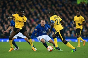 Framed Print : Everton's Aiden McGeady Fights for Possession in Europa League Clash vs Lille Framed Print : Everton's Aiden McGeady Fights for Possession in Europa League Clash vs Lille
