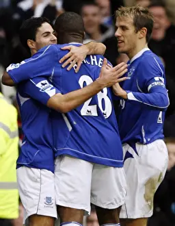 Evertons Arteta celebrates his goal against Chelsea with team mates during their English Premier Le