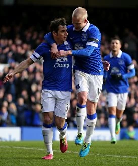 Images Dated 16th February 2014: Everton's Baines and Naismith Celebrate FA Cup Fifth Round Goal vs Swansea City (16-02-2014)