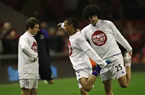13 March 2012 V Liverpool, Anfield Prints: Everton's Baines, Pienaar, and Fellaini: United in Focus During Anfield Warm-Up (13 March 2012)
