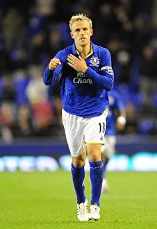 Images Dated 21st September 2011: Everton's Carling Cup Triumph: Phil Neville's Double Strikes Against West Bromwich Albion