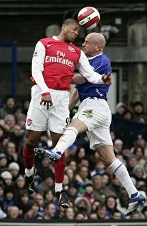 Images Dated 18th March 2007: Evertons Carsley challenges Arsenals Baptista for the ball during their English Premier League soc