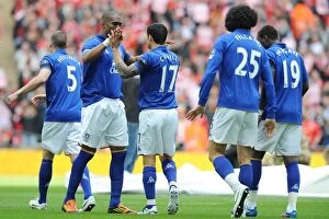 Images Dated 14th April 2012: Everton's Distin and Cahill: United in Determination Ahead of FA Cup Semi-Final Clash with
