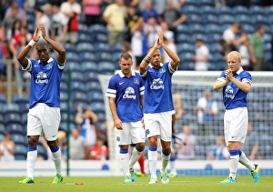 Pre-Season Friendly Prints: Everton's Distin, Heitinga