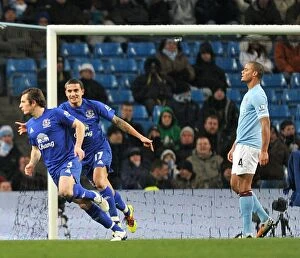 20 December 2010 Manchester City v Everton Collection: Everton's Double Delight: Leighton Baines and Tim Cahill Celebrate Second Goal vs