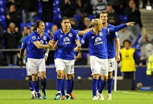 Images Dated 21st September 2011: Everton's Double Delight: Phil Neville Scores Second Goal vs