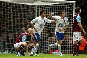 West Ham United 1 v Everton 2 : Upton Park : 22-12-2012 Collection: Everton's Double Delight: Pienaar and Baines Celebrate as West Ham Express Disappointment