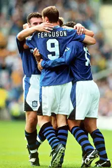 Everton's Duncan Ferguson Celebrates Euphoric Goal with Teammates (1996)