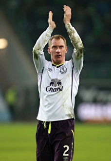Framed Print : Everton's Europa League Triumph: Tony Hibbert's Euphoric Victory Celebration vs. VfL Wolfsburg