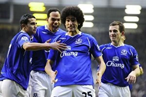 Everton v Hull City Collection: Everton's Fellaini Scores First Goal, Celebrated by Cahill, Lescott, and Baines (01.10.09)