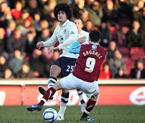 Images Dated 8th January 2011: Everton's Fierce Battle: Marouane Fellaini vs. Chris Dagnall at Glanford Park, FA Cup Third Round