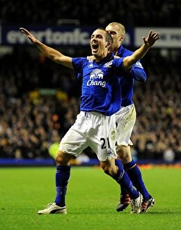 Images Dated 21st December 2011: Everton's Glorious Goal: Osman and Hibbert's Jubilant Moment vs Swansea City (December 2011)