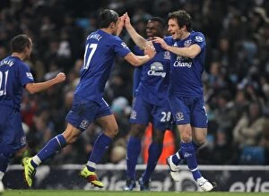 20 December 2010 Manchester City v Everton Collection: Everton's Glorious Moment: Tim Cahill and Leighton Baines Celebrate Their Goals Against Manchester