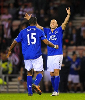 Framed Print : Everton's Glory: Distin and Heitinga Celebrate FA Cup Sixth Round Replay Victory over Sunderland Framed Print : Everton's Glory: Distin and Heitinga Celebrate FA Cup Sixth Round Replay Victory over Sunderland