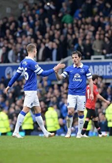 Images Dated 20th April 2014: Everton's Glory: John Stones and Leighton Baines Celebrate Historic 2-0 Victory Over Manchester